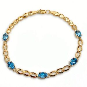 10k Solid Yellow Gold Genuine Blue Topaz Bracelet (7 inch).